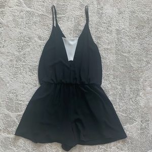 Black romper with cut out
